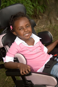 Smiling Girl in Wheel Chair